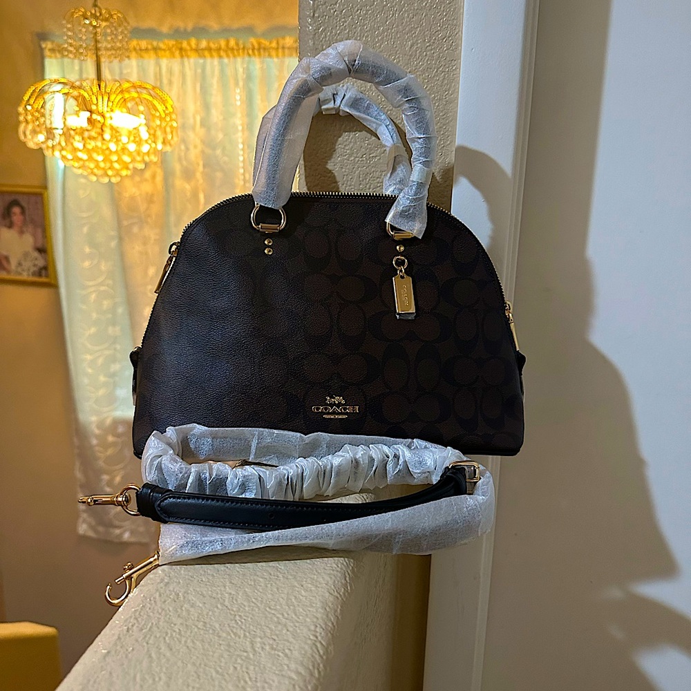 Coach- signature Kathy